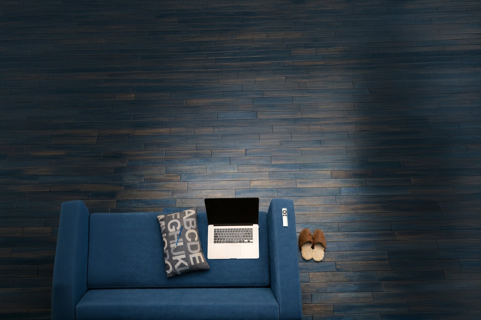 Calm, welcoming therapy room with couch and laptop at EMDR Brisbane
